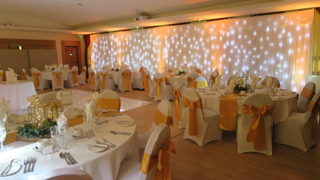 The Warren, Kent, White Starlit Backdrop, Yellow Uplighting